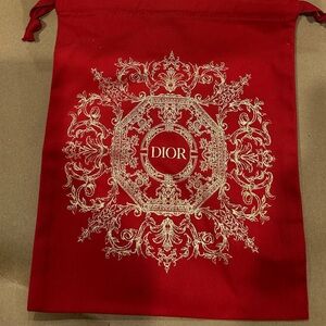 Lot of 4 dior beauty pouches and 1 Valentino pouch